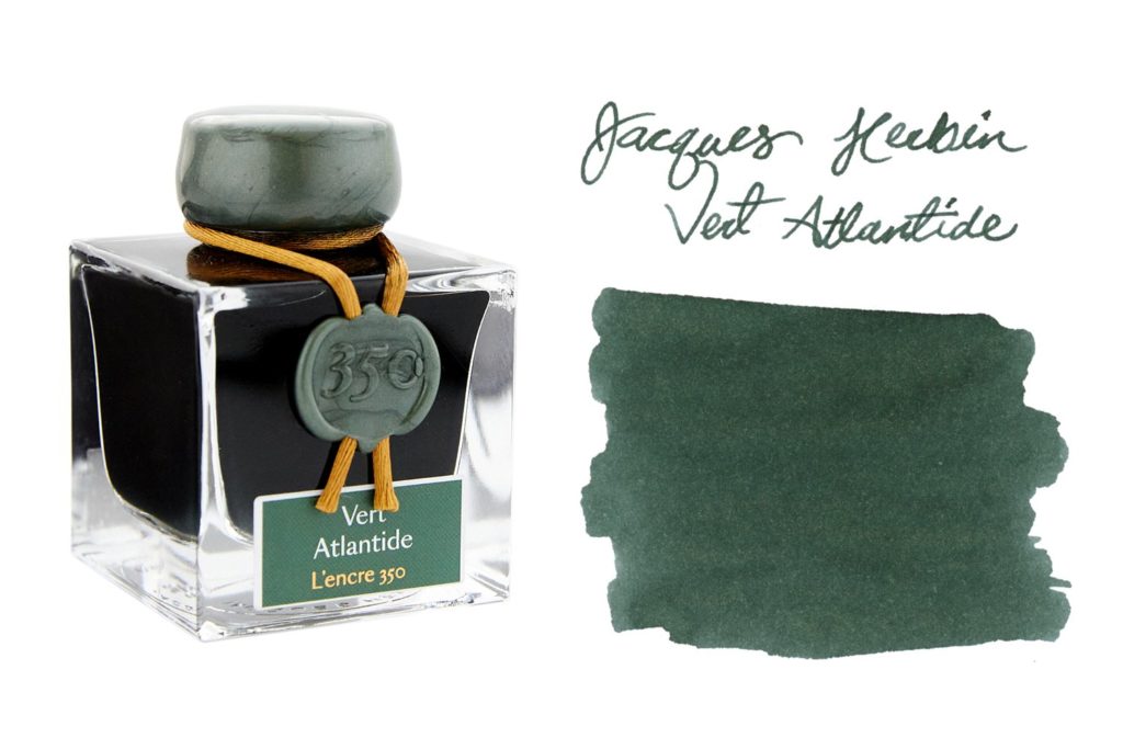 Bottle of Jacques Herbin 350 Vert Atlantide fountain pen ink on white with ink swab