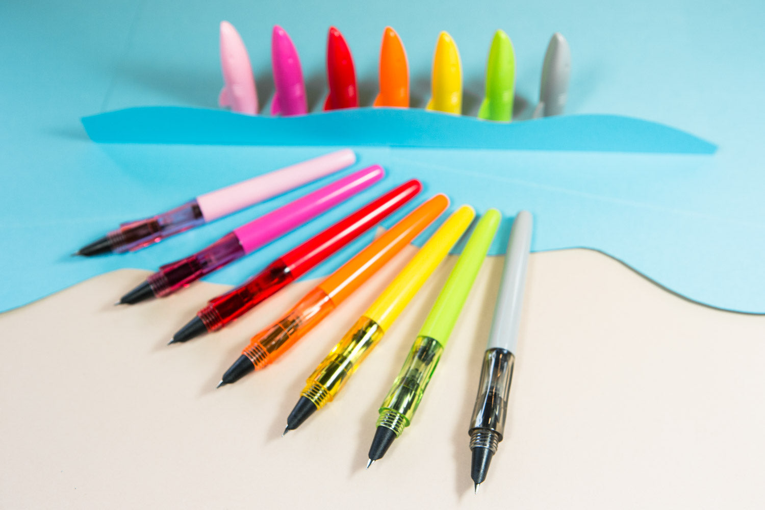 Assorted Rainbow color Jinhao shark fountain pens uncaped