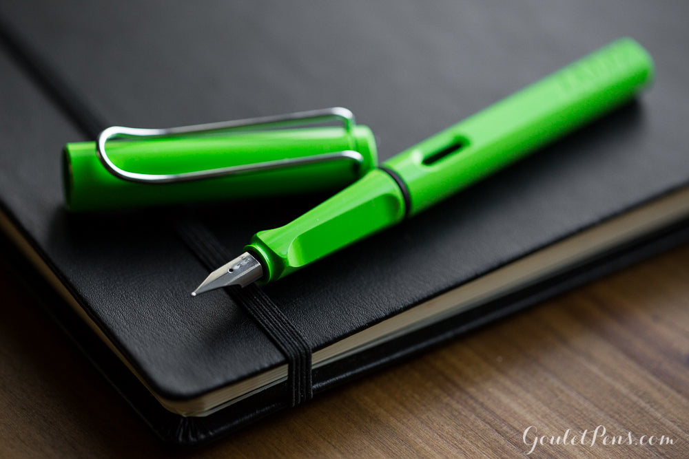 LAMY safari green uncapped on a notebook