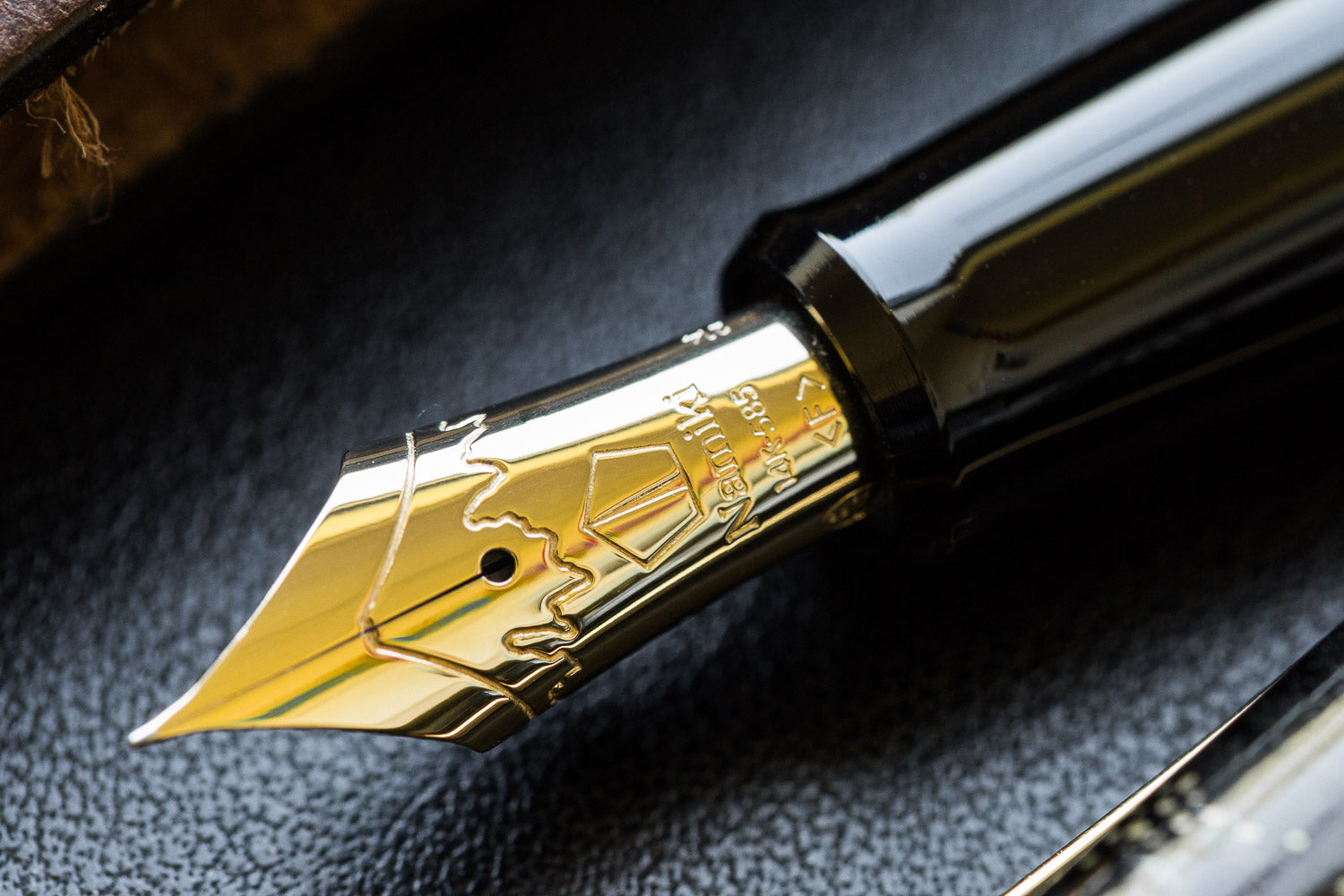 Close of up Namiki Nippon Art Maki-e fountain pen nib in gold