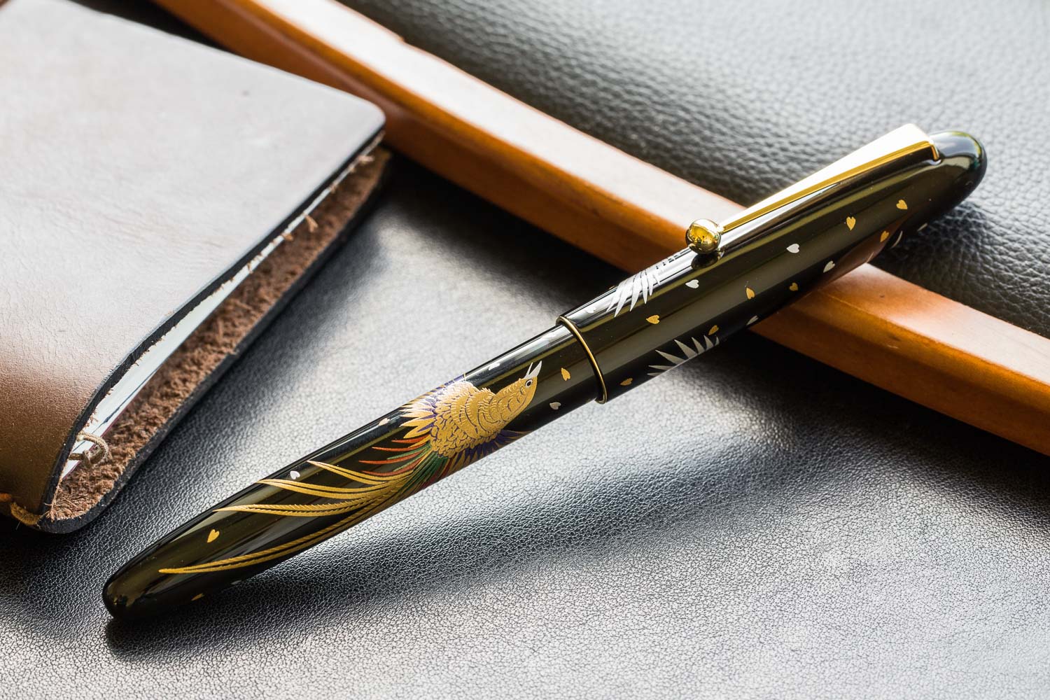 Pilot Namiki Nippon Art Maki-e fountain pen Golden Pheasant fountain pen capped on dark background