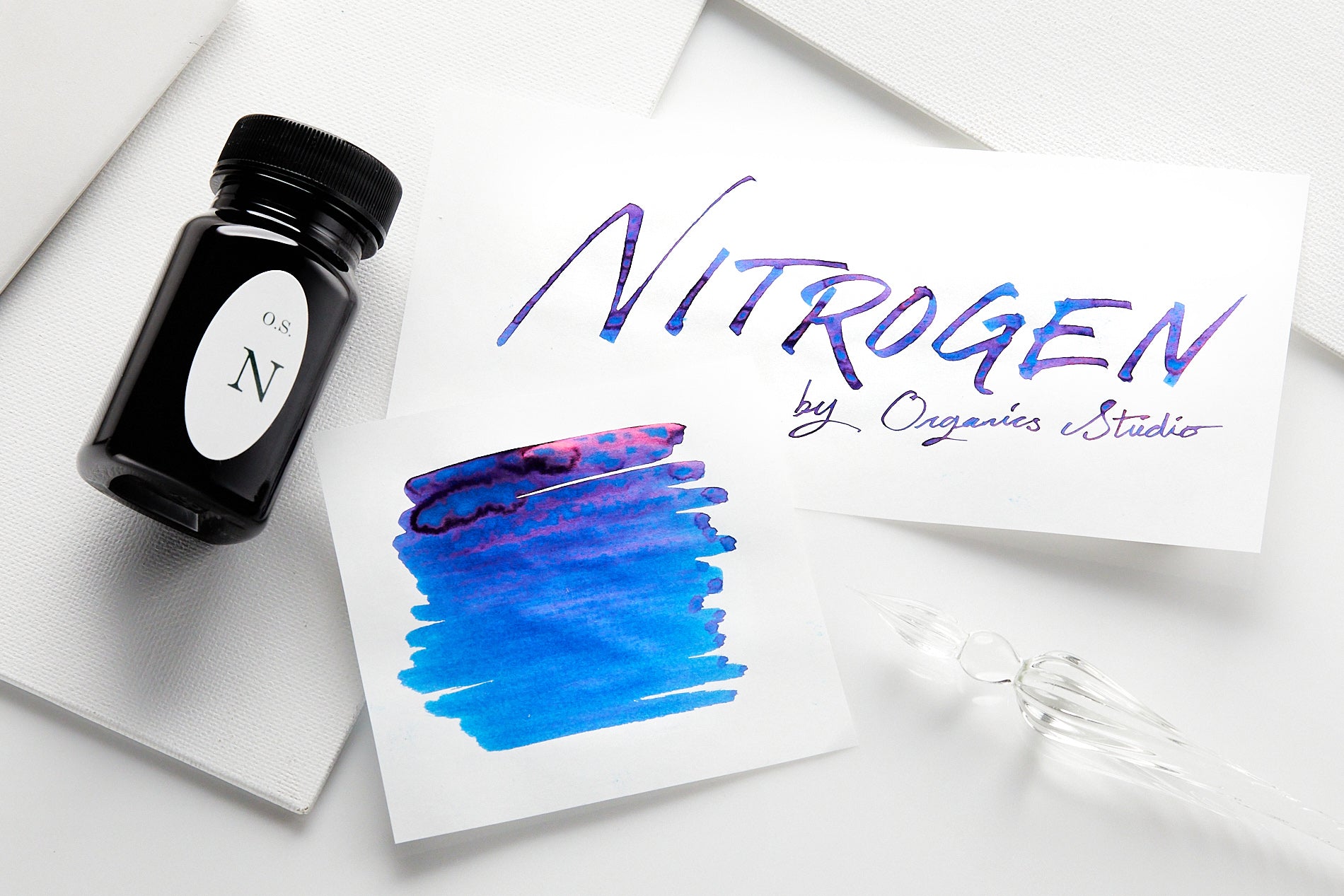 Organics Studios Nitrogen ink bottle, swab on white background with Nitrogen written off to the side on a white background