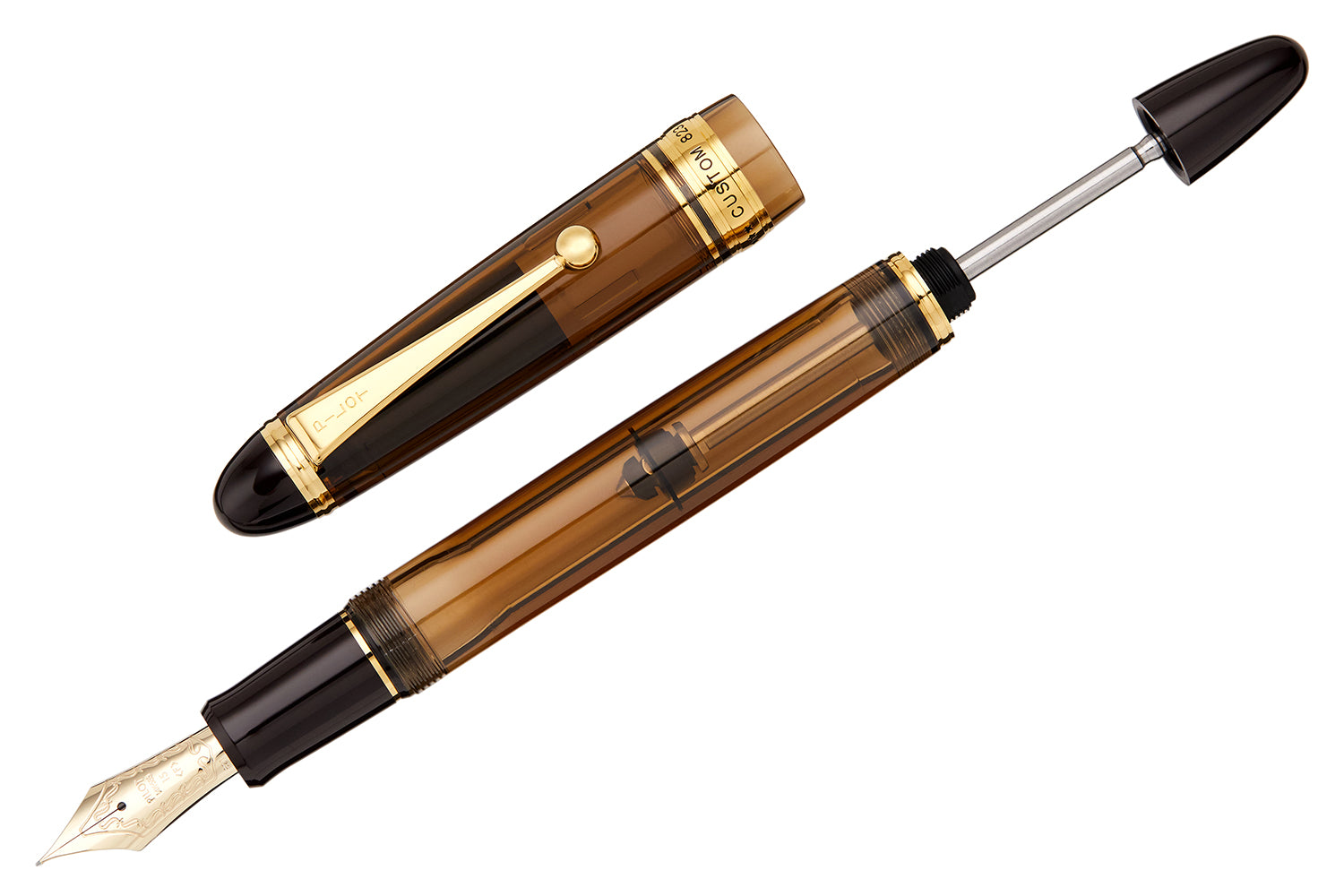 A translucent brown Pilot fountain pen with the cap off and vacuum rod extended