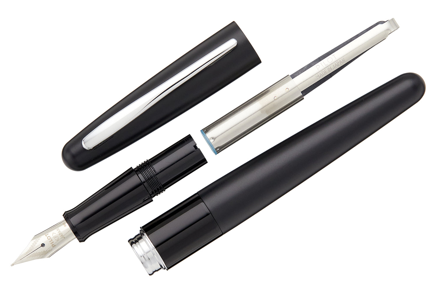 A black Pilot fountain pen, disassembled, on a white background