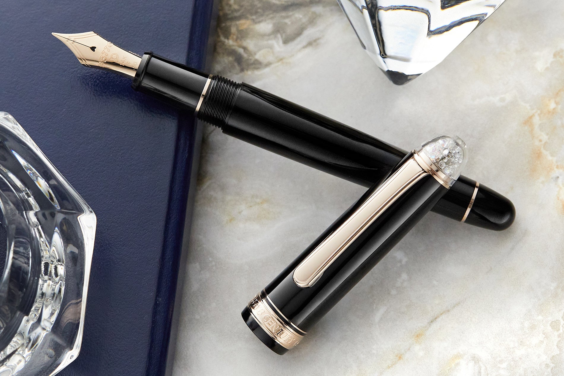Black fountain pen with gold trim