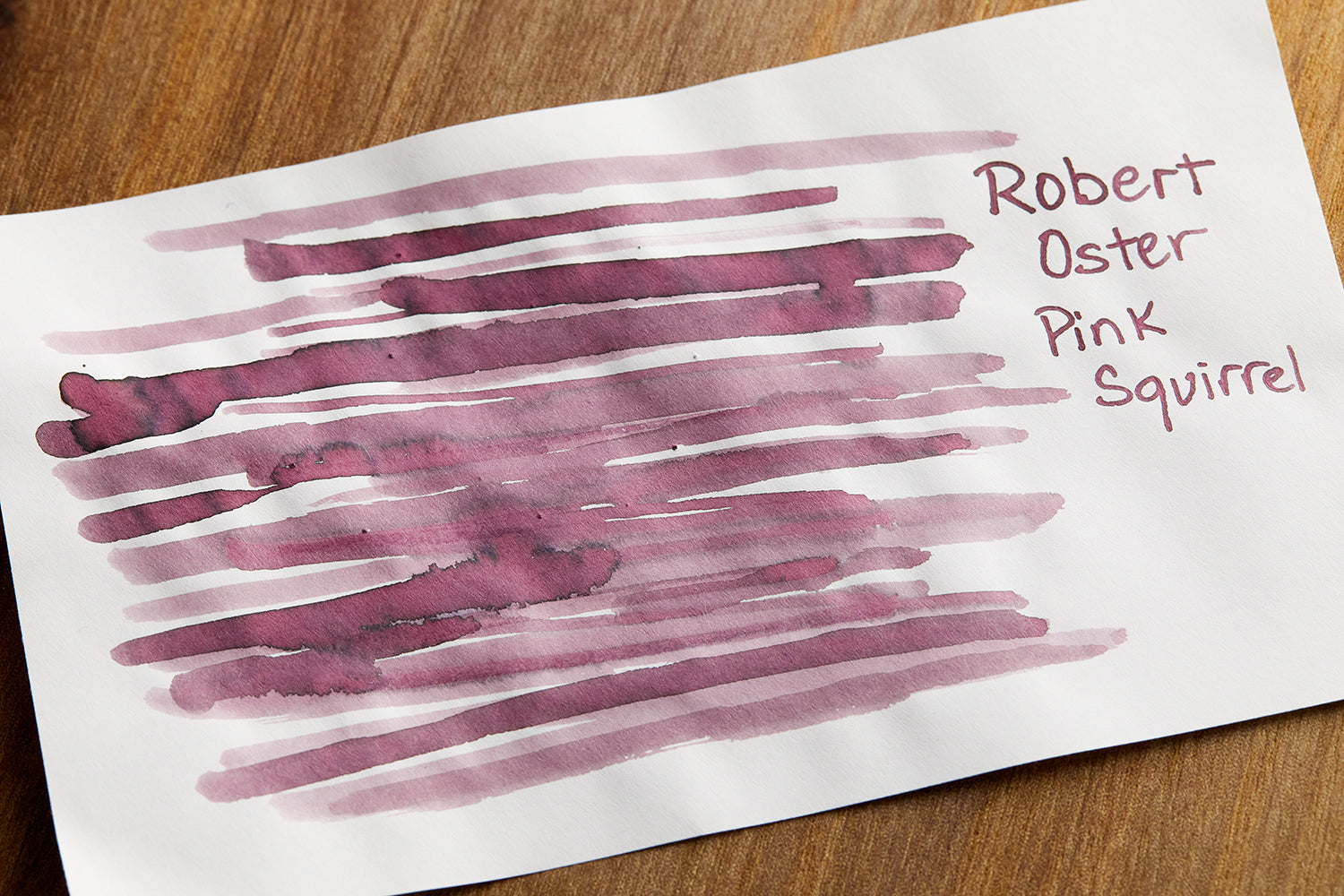 Robert Oster Pink Squirrel fountain pen ink writing sample on blank white paper