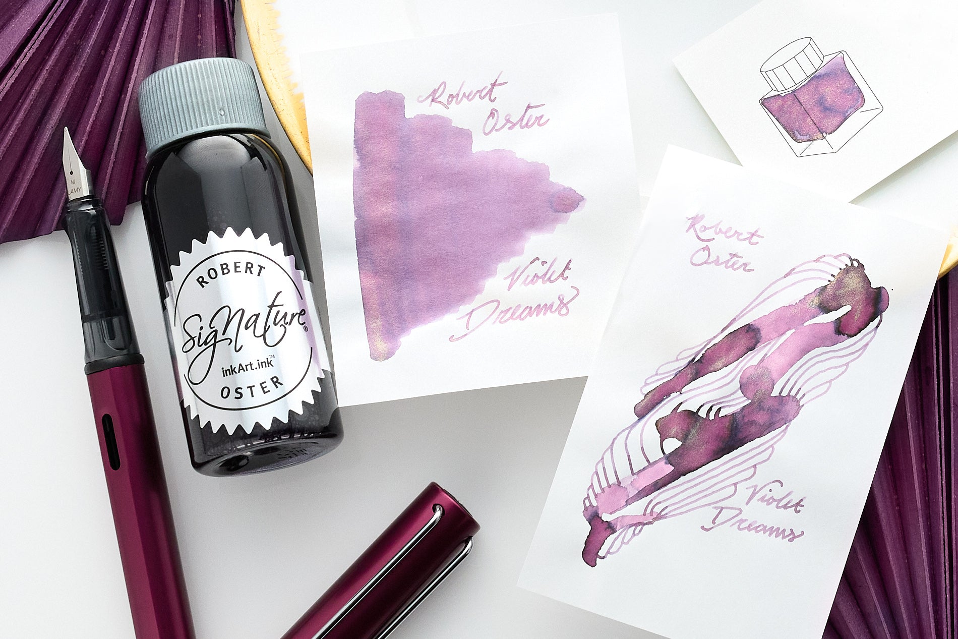Robert Oster violet Dreams With examples and bottles on paper