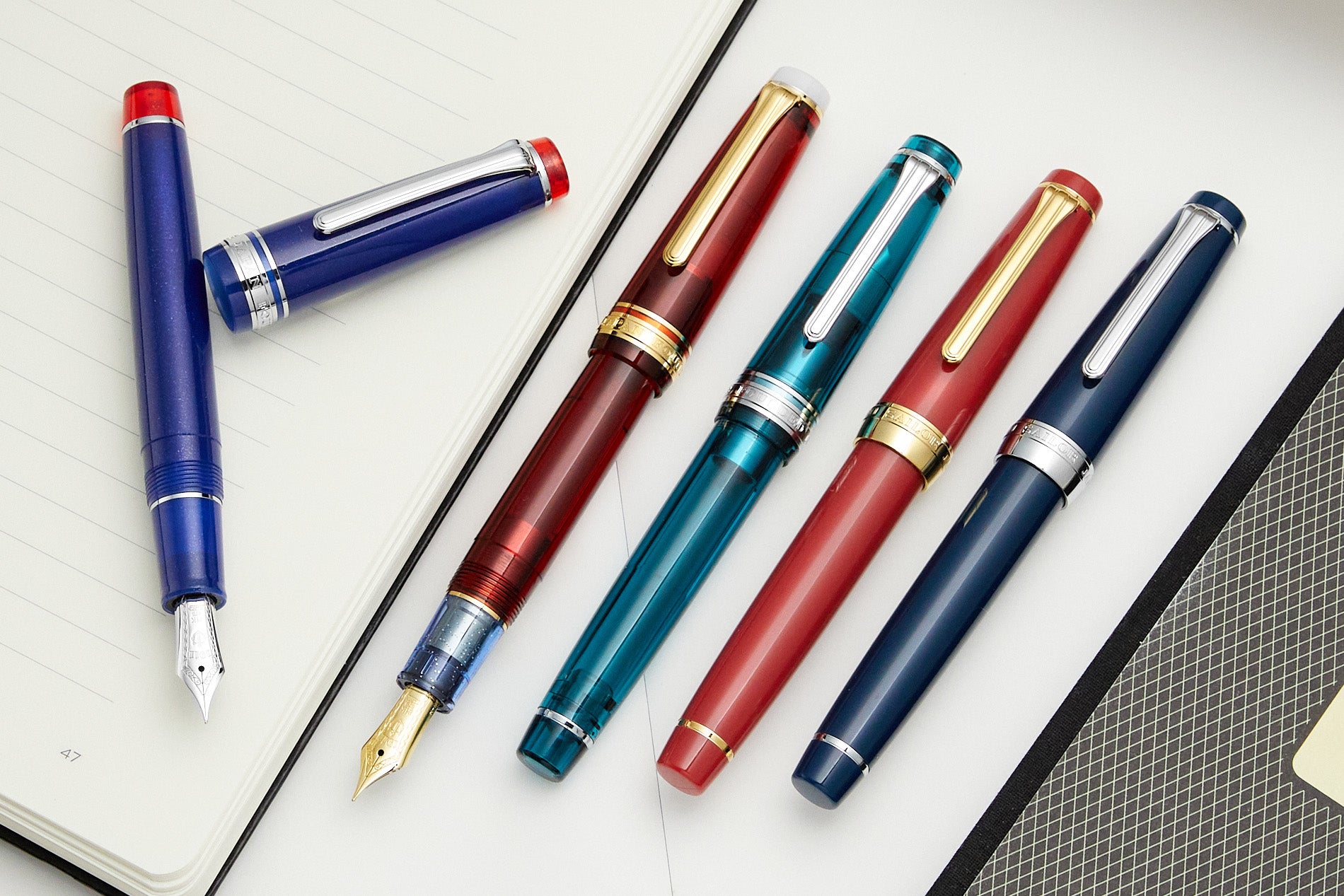 Five colorful Sailor Pro Gear fountain pens