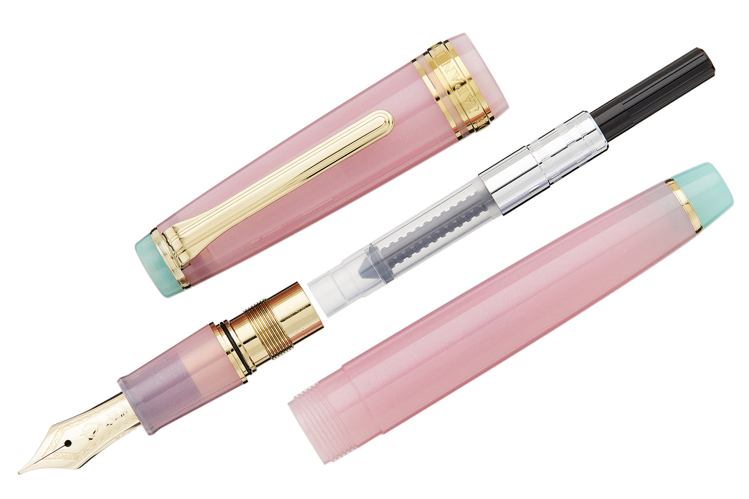A pink fountain pen with a converter on a white background