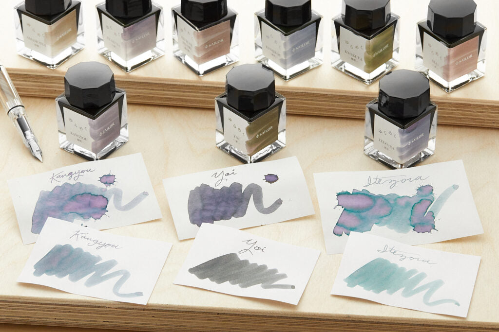 3 bottles of Yurameku inks with swatches in front of the bottles. 