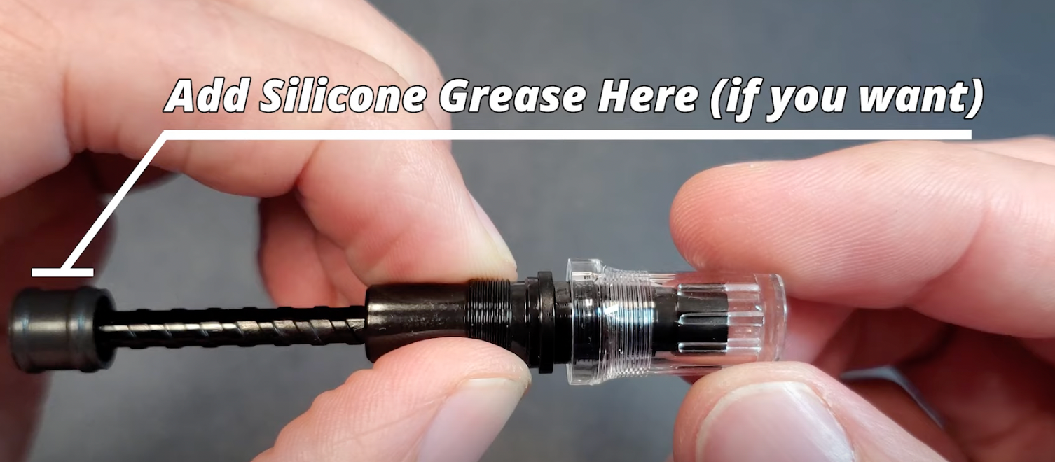 Infographic showing where to add Silicone grease to the gasket on a TWSBI ECO piston rod