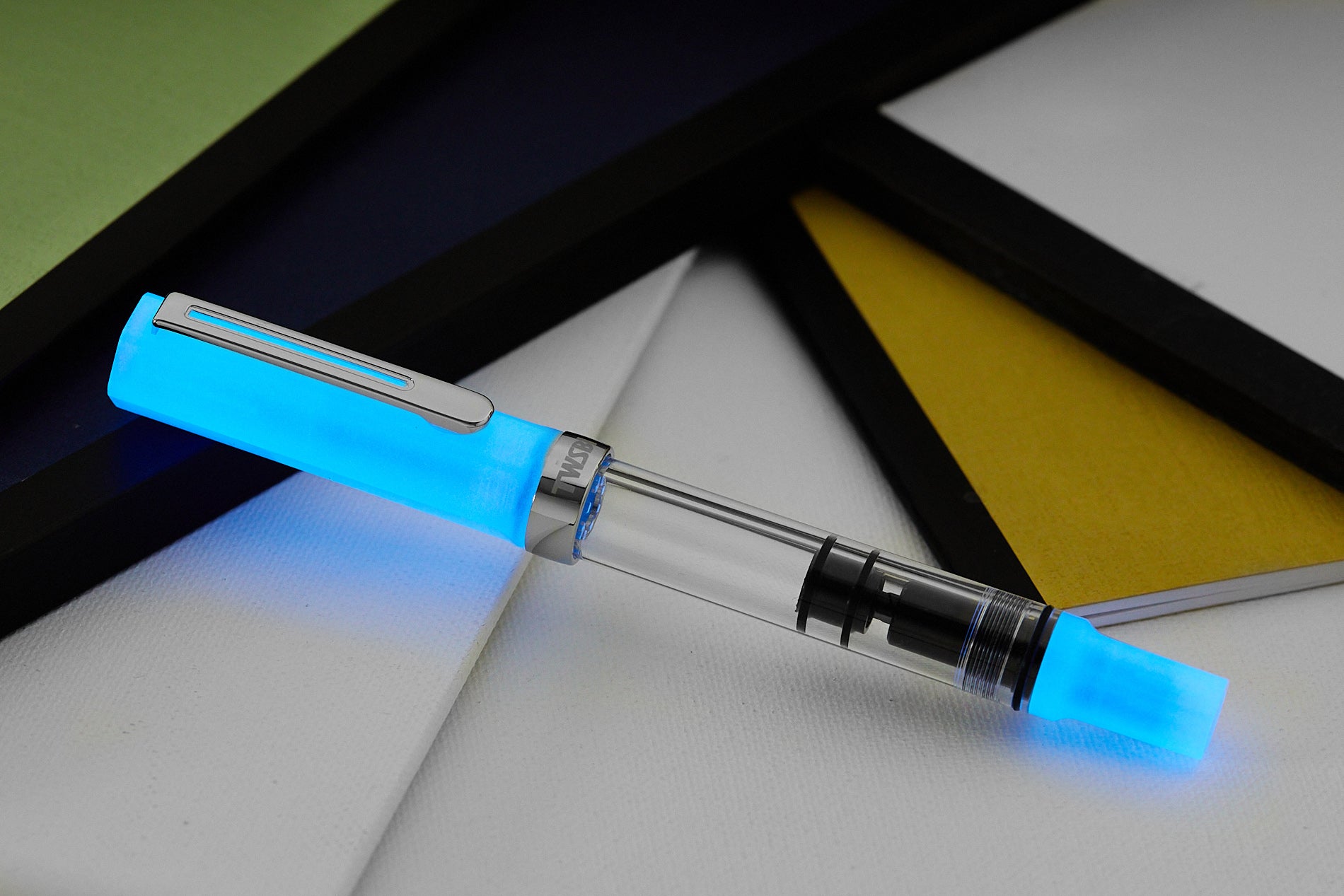 TWSBI ECO fountain pen glowing in the dark