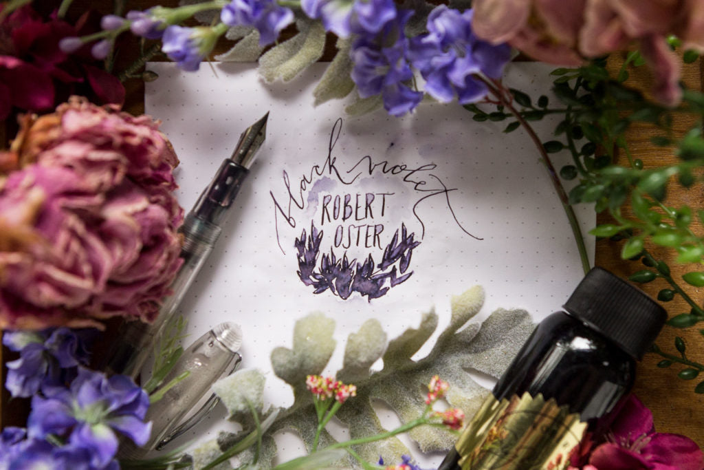 Flowers circling hand written Robert Oster Black Violet ink