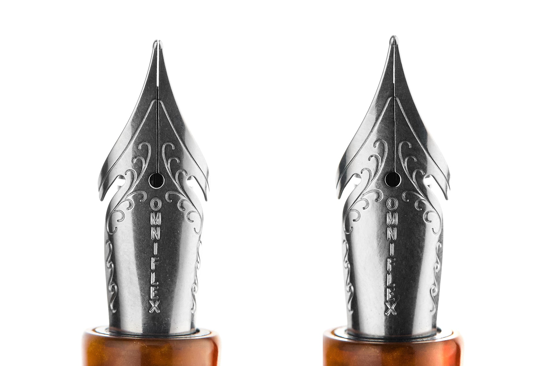 Two nibs side by side, one with a larger space between the tines