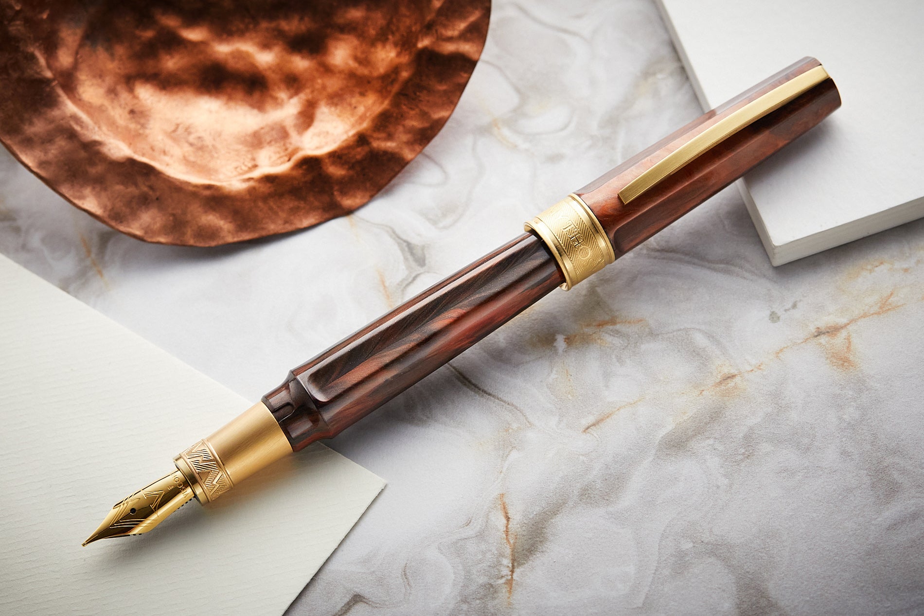 Visconti Mirage Mythos fountain pen in brown on top of a marble background