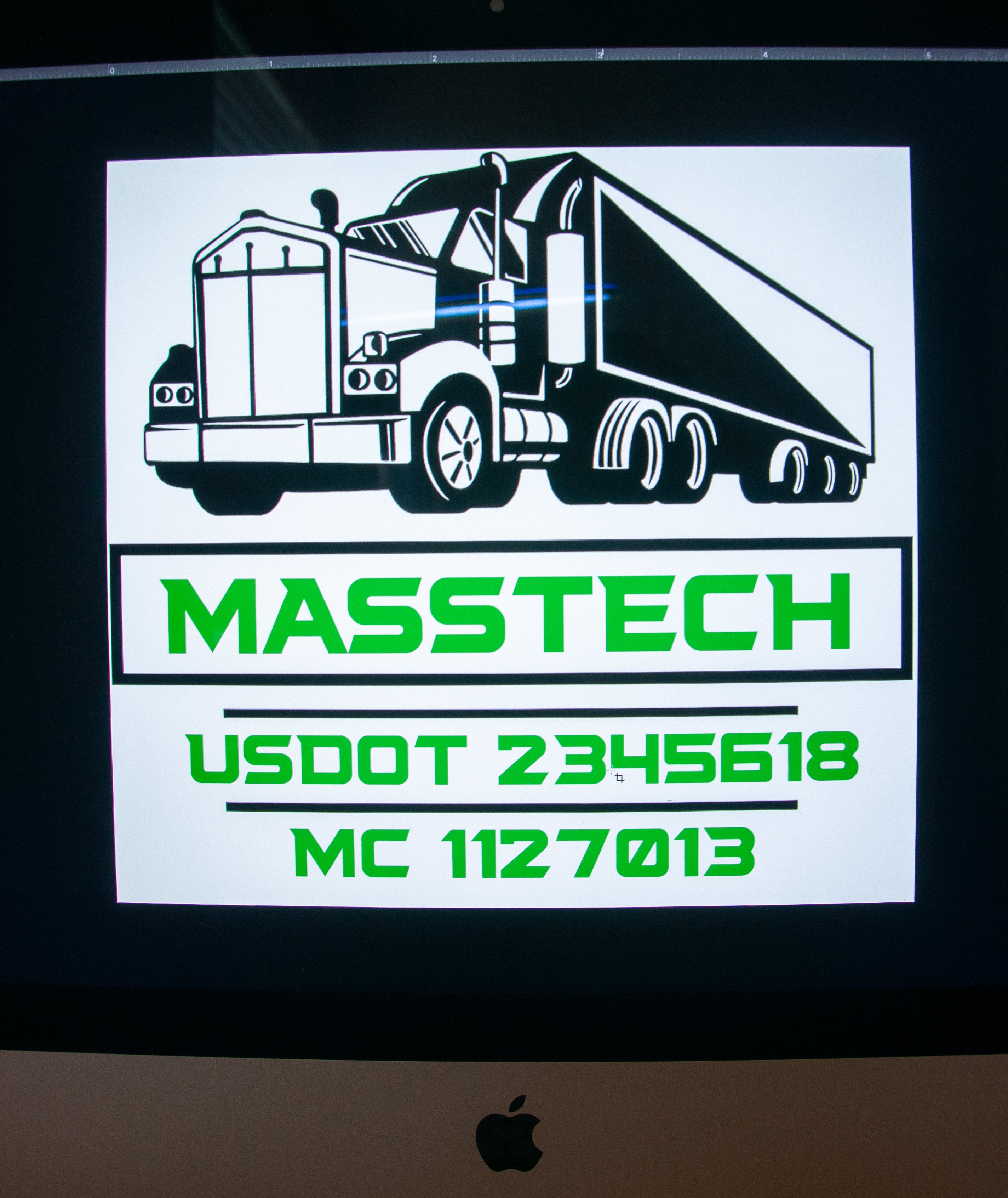 usdot mc lettering decal on a computer