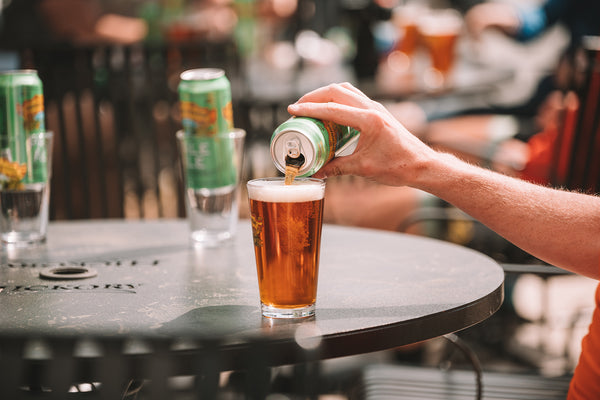 cyclists enjoy a mid-adventure Sierra Nevada beer in Hickory, NC