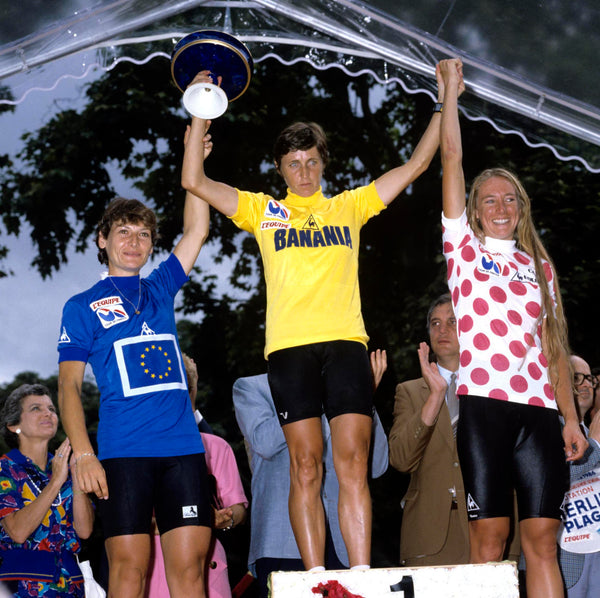 Italian superstar Maria Canins celebrating her yellow jersey flanked by Jeannie Longo (l) and American Inga Thompson wearing the polka dot Queen of the Mountains jersey
