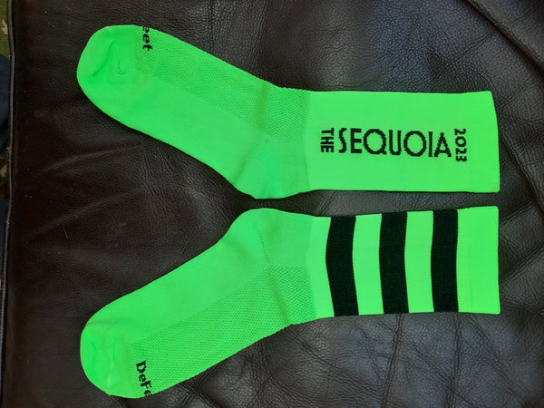 a pair of lime green custom DeFeet socks 