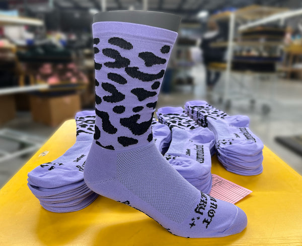 custom purple leopard DeFeet cycling socks by Bummerland