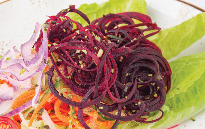 Top salads with enjoyable noodled beets, cucumber, and more.