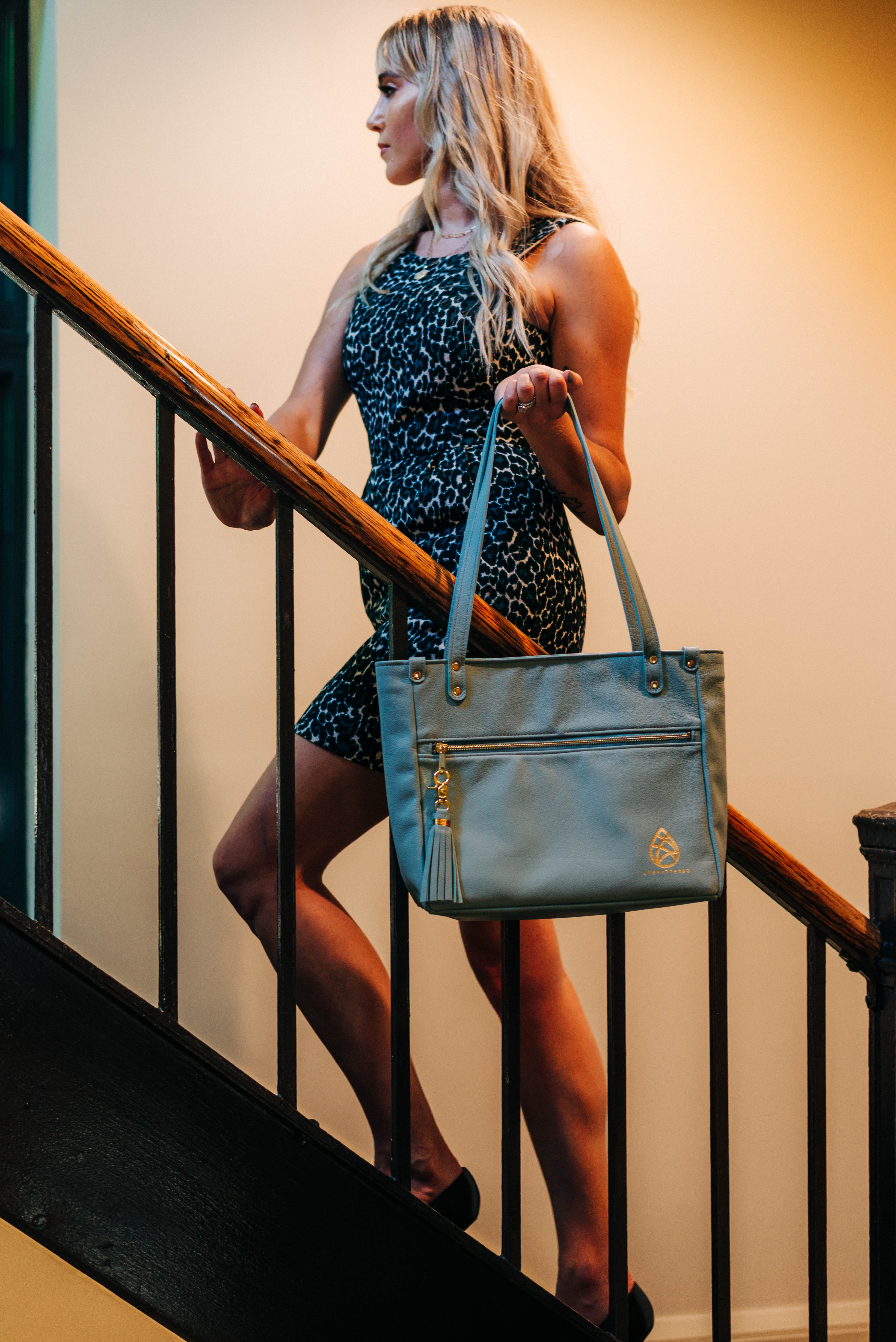 Investment Collection Tote held by model Donna