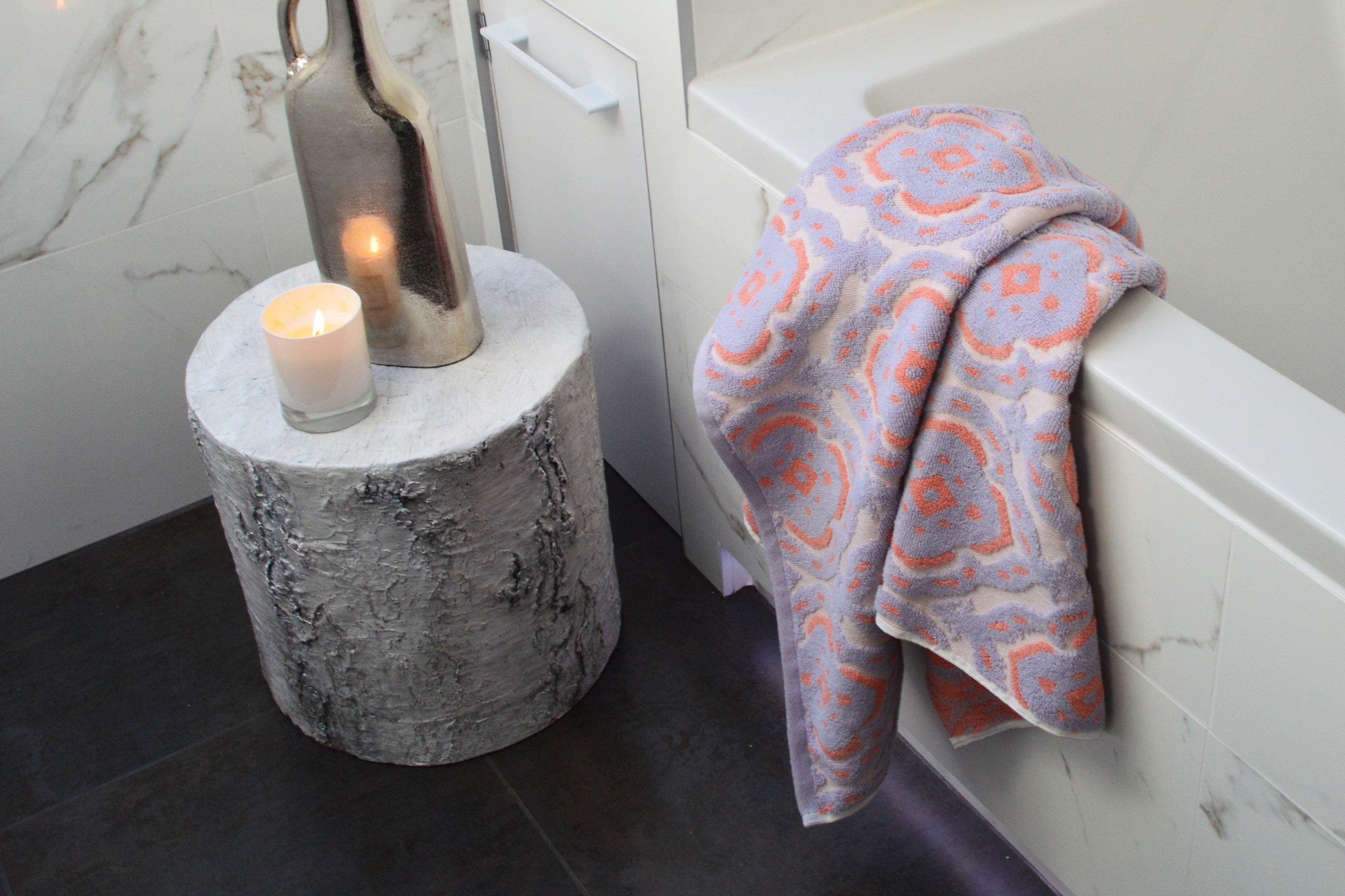 lilac and coral patterned towels