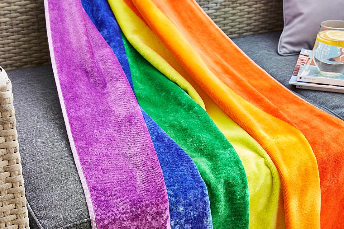Rainbow Beach Towel on Sofa