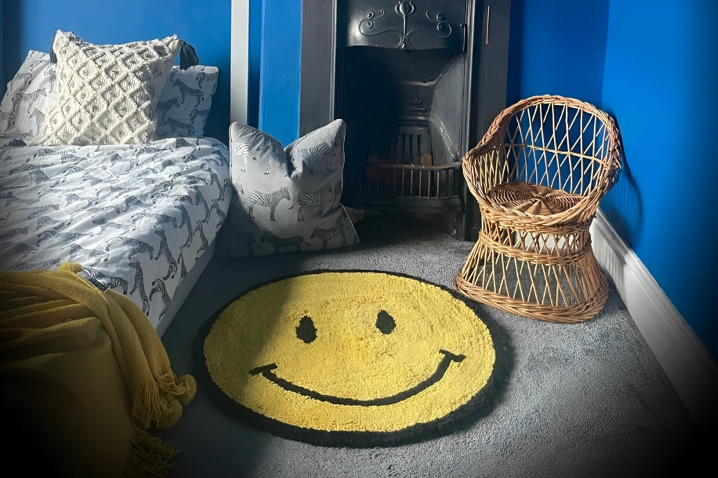 Smiley Face Bath Mat on Bedroom Floor