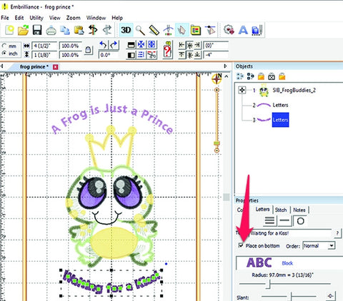 Picture of machine appliqued frog prince highlighting bottom curved text.