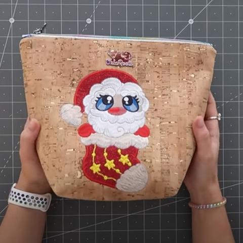 Picture of machine appliqued Santa on Zip Bag at Sew Inspired by Bonnie