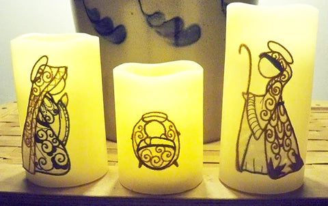 Picture of Nativity embroidery designs on candles at Sew Inspired by Bonnie