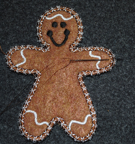 Picture of machine embroidered applique gingerbread man from Sew Inspired by Bonnie