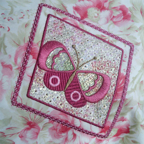 Picture of butterfly on top of wing needle machine embroidery work on Bonnie's Blog at Sew Inspired by Bonnie
