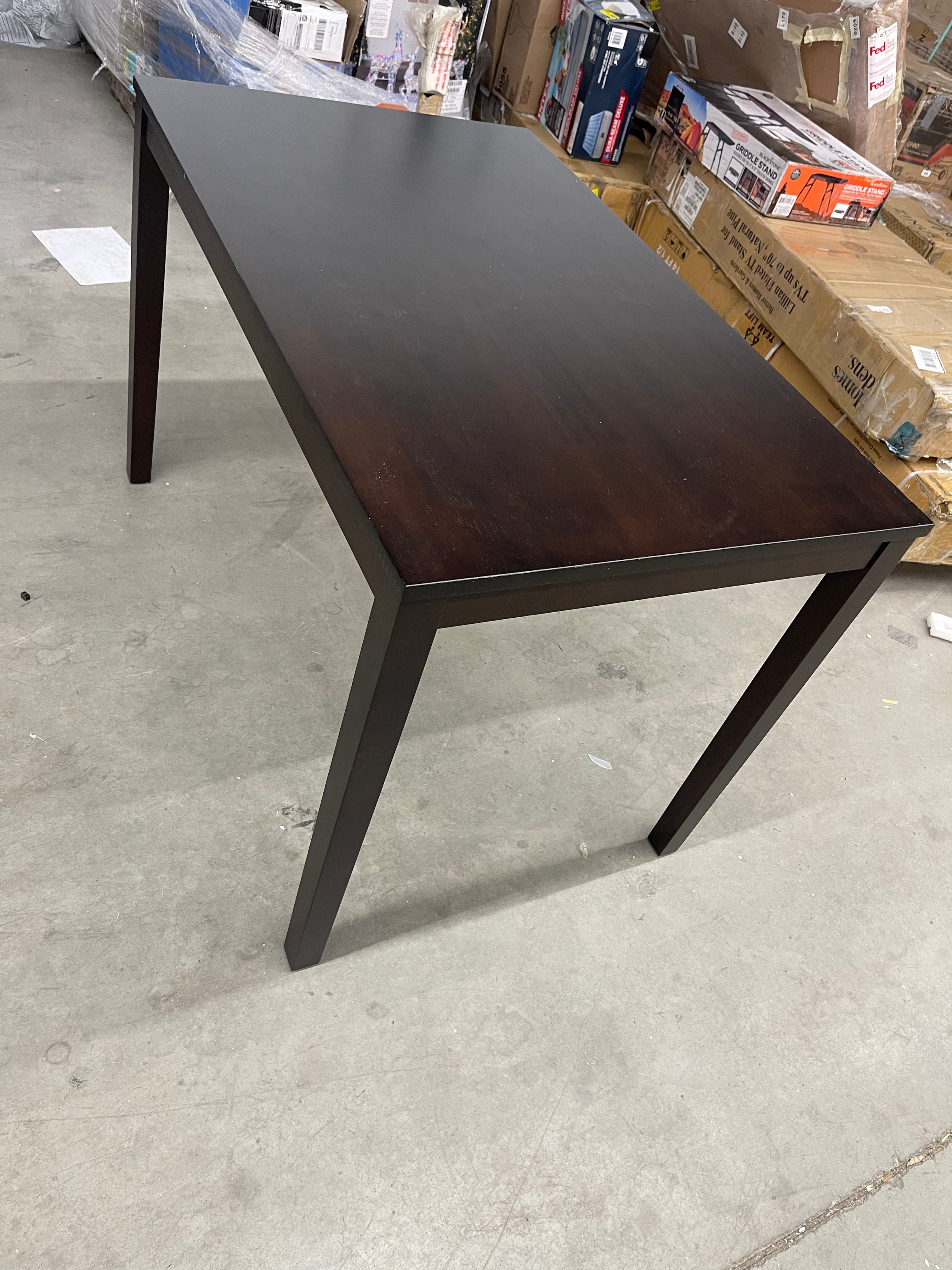 Dining table - 44” long by 28” wide and 30” tall- solid wood and new