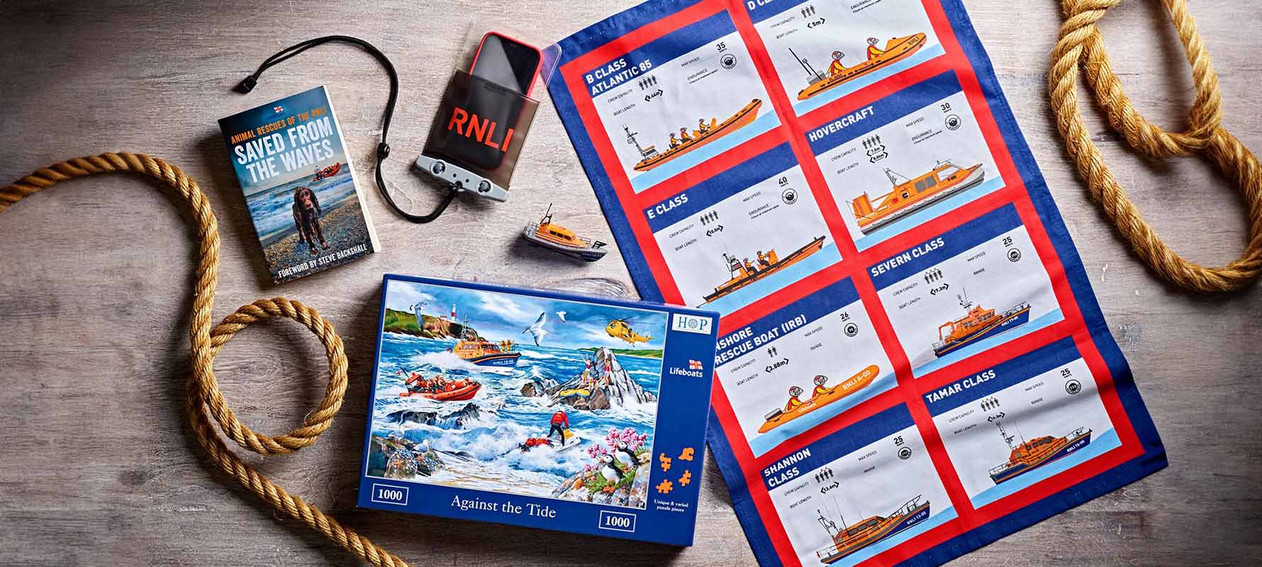 Lay flat shot of a selection of favourite items from the RNLI shop 