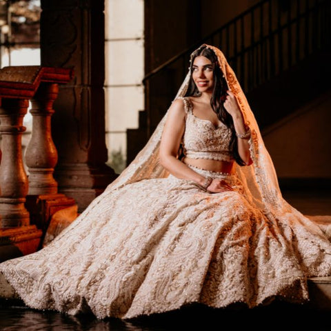 Women wearing a traditional indian wedding dress