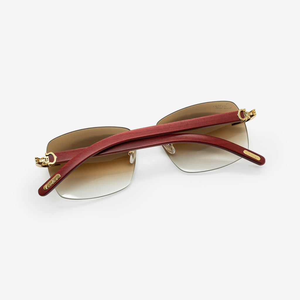 gold cartier rimless glasses