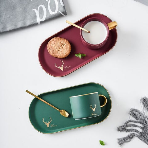 Coffee mugs with built-in snack trays