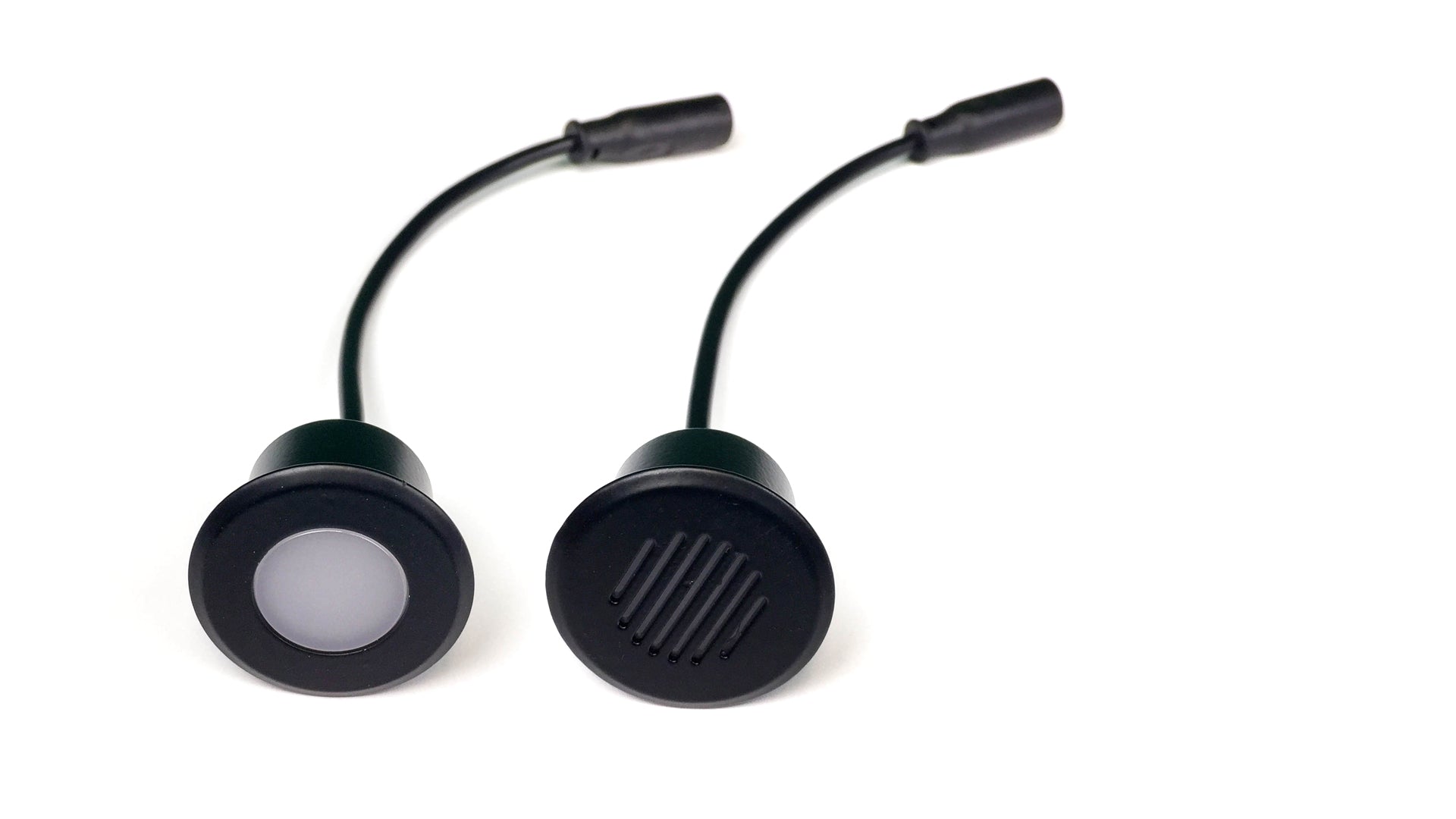 two uninstalled deck lights by Haven Lighting