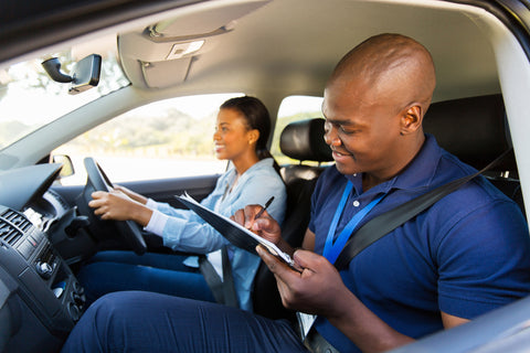 girl taking driving test