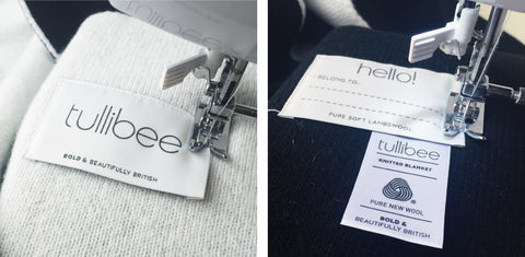 tullibee knitted blanket labels being sewn on