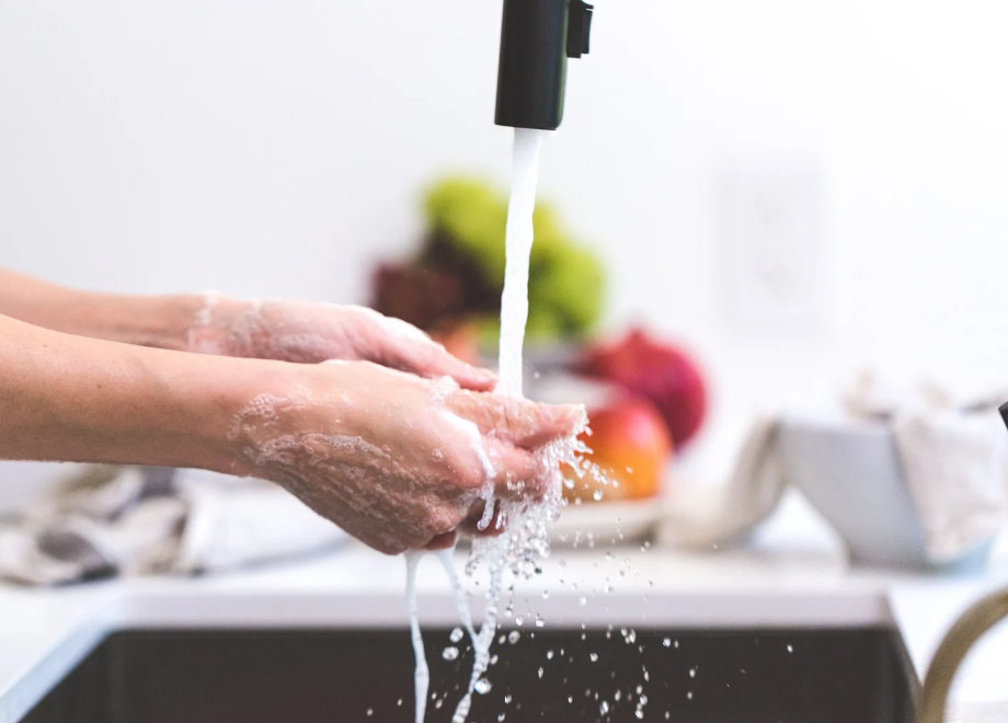 person washing hands