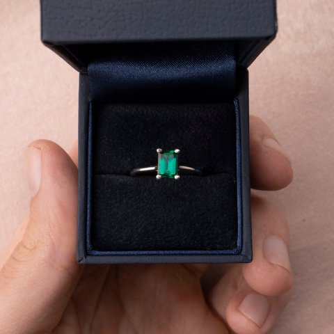 Emerald engagement ring in box