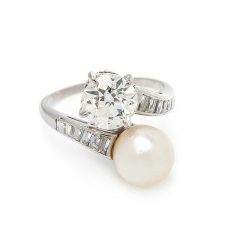 Toi et Moi engagement ring with diamond and pearl