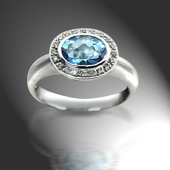 Oval Blue Topaz Ring with Diamonds | TheNetJeweler