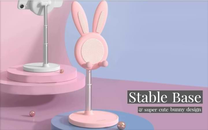 Super cute bunny design supported by large circular base. White and pink Boston Bunny Phone Stands shown at varying telescopic stand extensions