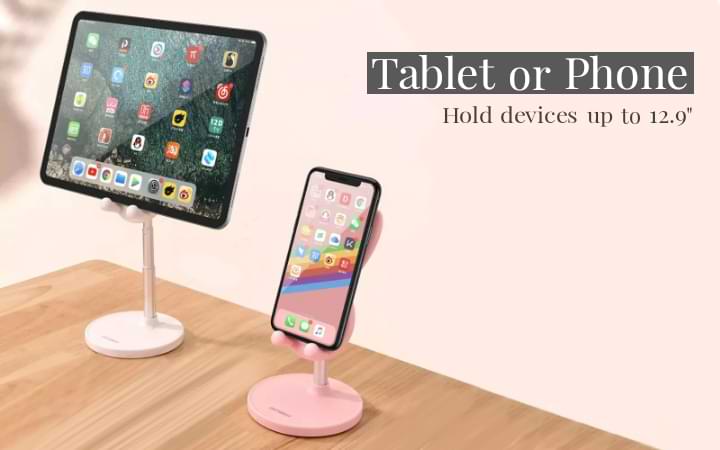 White Boston Bunny Phone Stand holding tablet and pink Boston Bunny Phone Stand holding mobile phone on wood finish desk. Safely supports devices up to 12.9 inches in size