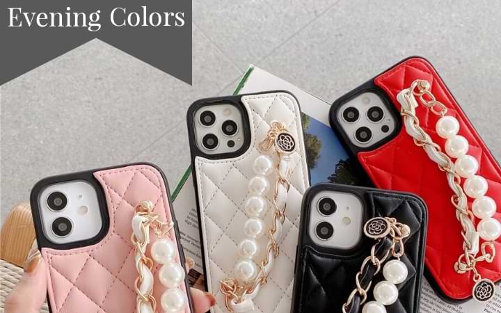 Image of four Claire Camelia Quilted Phone Cases, pearl and chain link straps visible. From left to right: pink, white, black & red