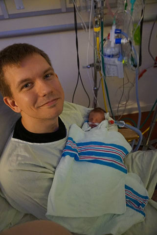 A preemie's first cuddles with dad